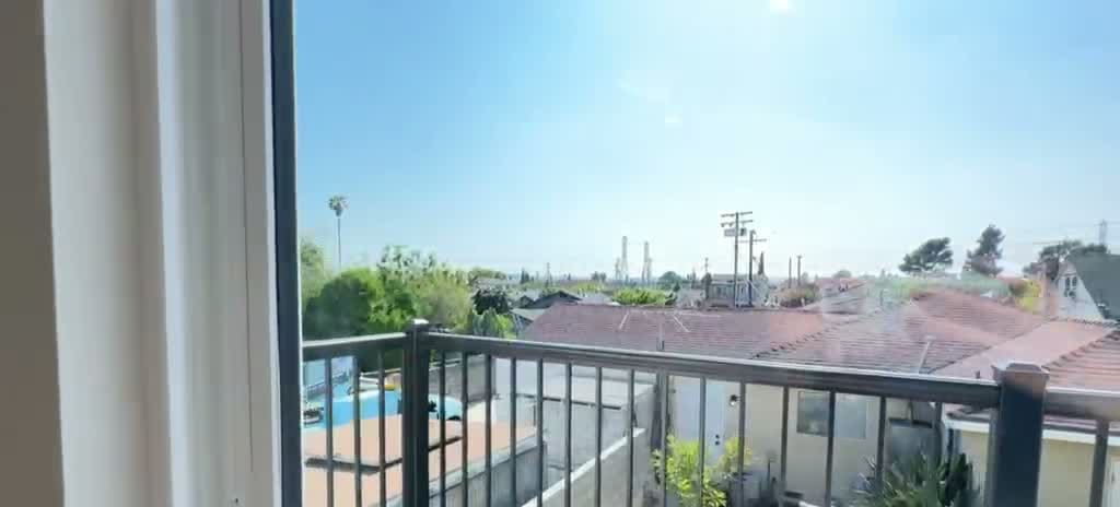 Private second-floor balcony of a Rosemead two-story ADU overlooking the neighborhood