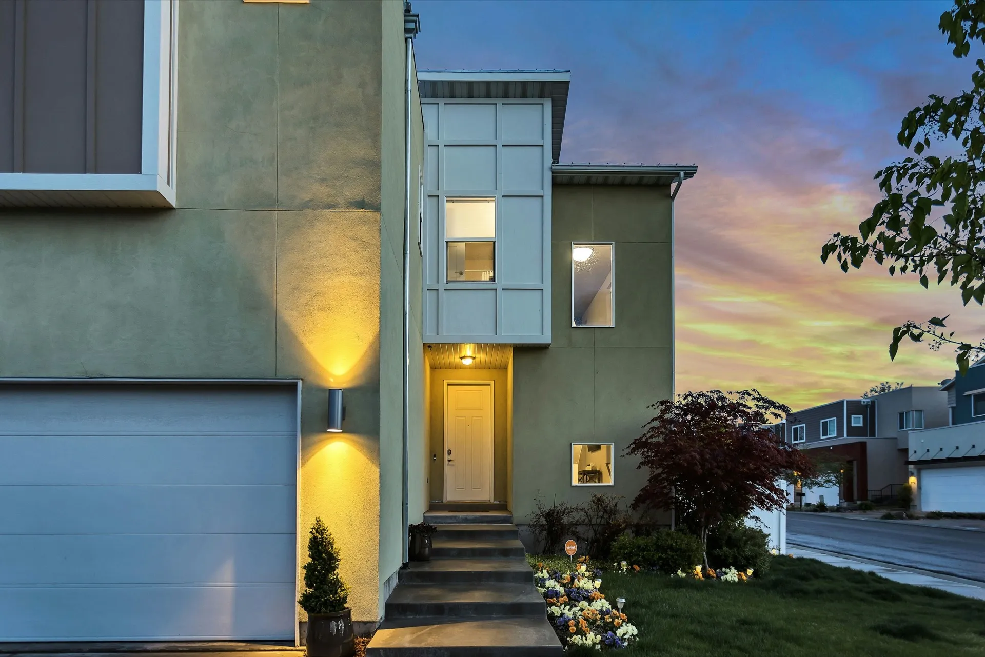 Modern ADU exterior at dusk in an Orange County backyard